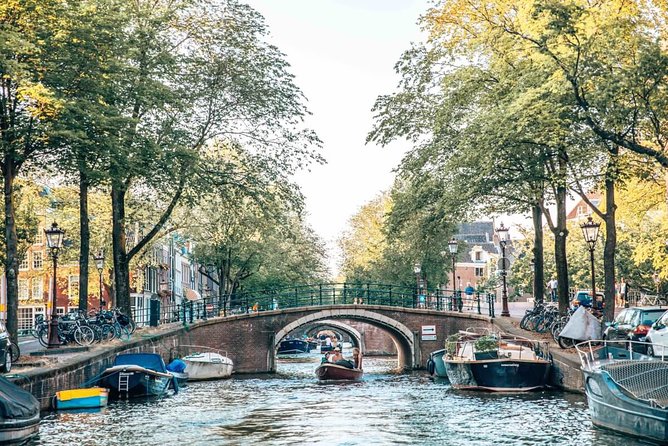 Private Romantic Canal Cruise Amsterdam with Bubbly and Snacks - UNESCO canal views and the early merchant story