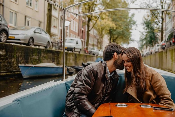 Private Romantic Canal Cruise Amsterdam with Bubbly and Snacks - Houseboats, iconic bridge moments, and the romance legend