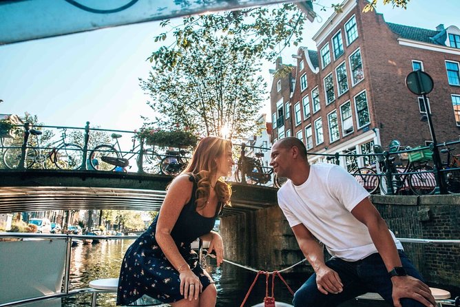 Private Romantic Canal Cruise Amsterdam with Bubbly and Snacks - Boat comfort: heated seats, retractable roof, and snuggle-friendly details