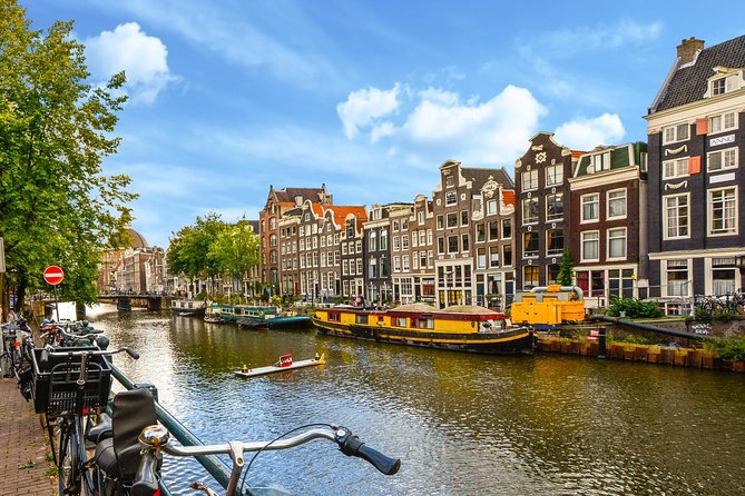 Private Tour: Amsterdam City Walking Tour and Canal Cruise - A 3-hour walk-and-canal combo that actually helps you plan the rest