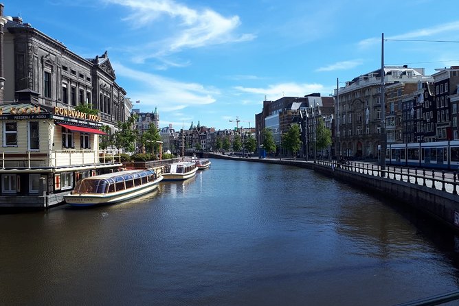 Private Tour: Amsterdam City Walking Tour and Canal Cruise - Albert Cuyp Market: why the tour ends on real local shopping energy