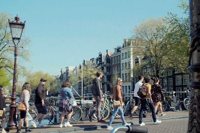 Private Tour: Amsterdam's City Highlights and Hidden Gems - Hotel pickup in Amsterdam: small detail, big difference