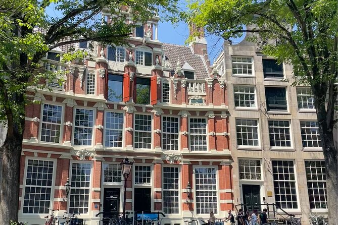 Private Walking Tour of Amsterdam - Stop 3: Amsterdam’s royal square, church, and war monument focus