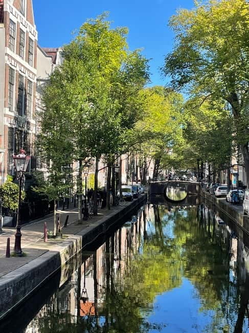 REDKULT: Red Light District & Historical City Center - Starting at Beursplein 4, easy to reach and easy to spot