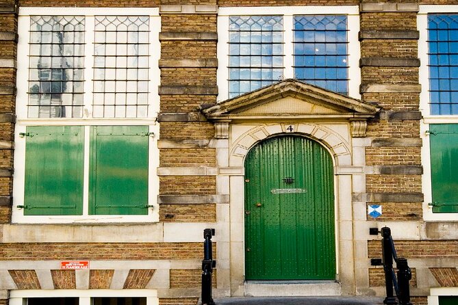 Rembrandt House & Neighborhood Guided Tour Semi-Private 8ppl Max - Flower Market, Munttoren, and the Medieval Gate Tower Feel