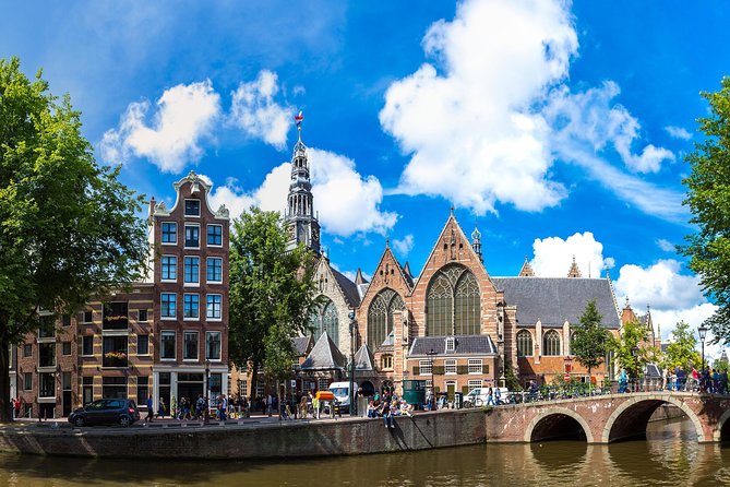 Secrets of Amsterdam Walking Tour plus Dutch Sweets Tasting - Munt Tower (Munttoren): learning the city through one landmark