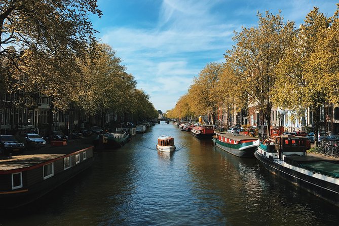 See Shoot Share | Photo Tour - Stop 2: Amsterdam Canal Ring and phone coaching for light, lines, and symmetry