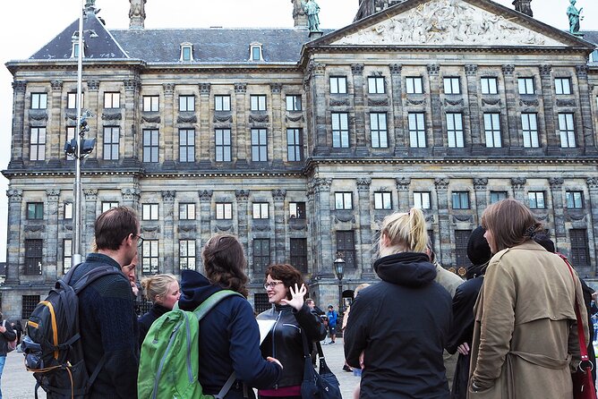 Small-Group Women's History Tour in Amsterdam - Queen Wilhelmina statue: learning leadership through public presence