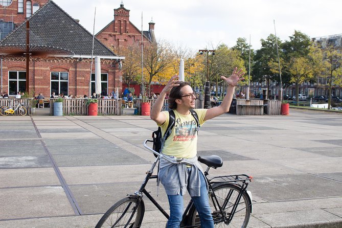 Urban Adventures Amsterdam Bike Tour, Graffiti and Magnet Fishing - Jordaan alleys: the old working-class neighborhood feel