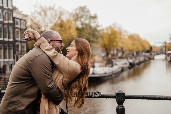 Vacation Photoshoot & Tour in Amsterdam - Damrak and your choice of backdrops: the real secret sauce