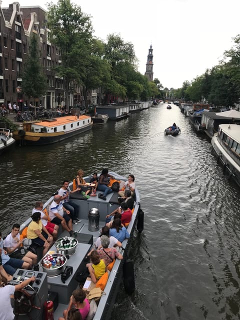 Visit Amsterdam by Boat with a French Guide (french) - Where You Start at Oosterdokskade 8 (Near Centraal, Easy on Foot)