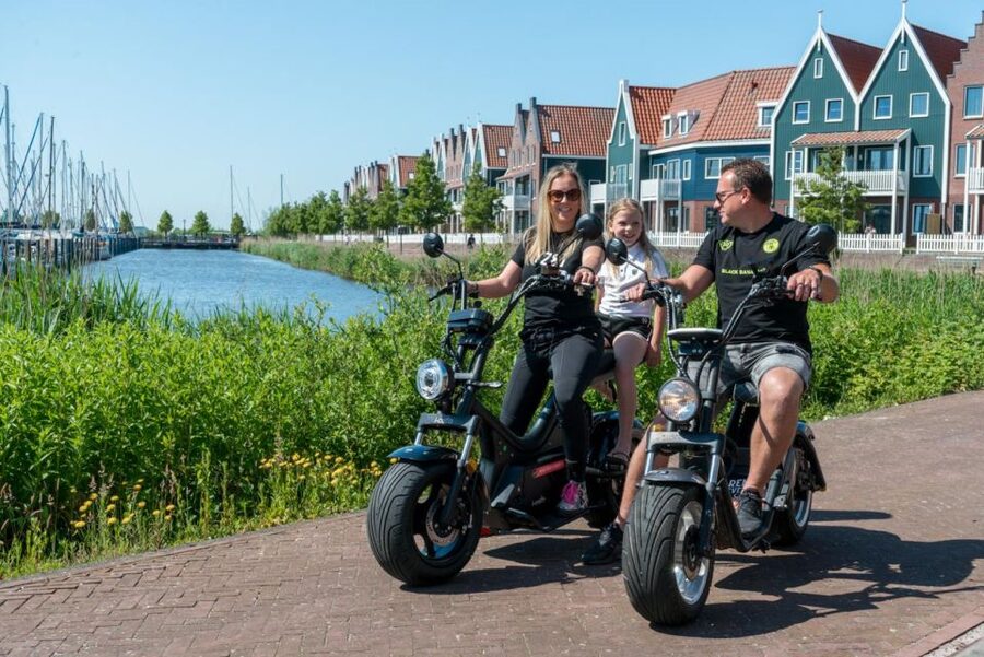 Volendam: E-Scooter Rental - Volendam’s dike departure: why this feels different from a bus or bike day