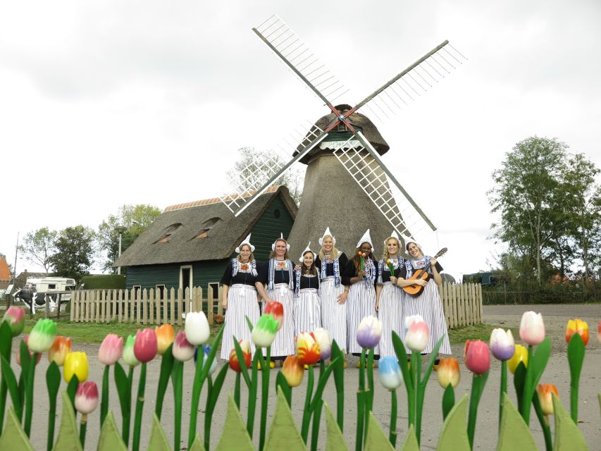 Volendam: Traditional Costume Photo with Cheese & Clog Tour - Volendam in 60 Minutes: costumes, cheese, and wooden clogs