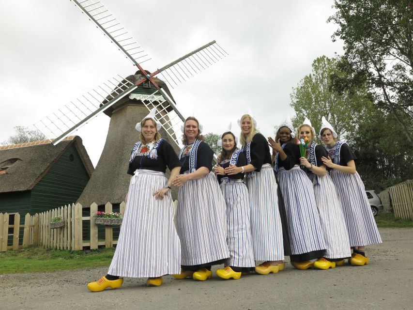 Volendam: Traditional Costume Photo with Cheese & Clog Tour - The shop experience: stroopwafel, fruit wine, and serious cheese tasting