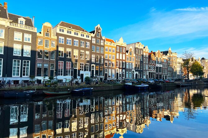 Walking Tour about Golden Age Architecture, private local guide - Jordaan Facade Stones And The Neighborhood Map You Can Reuse
