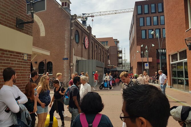 Walking Tour of Haarlem with a Local Guide - Stop 3: Spaarne river, tide schedules, and the boat-to-Amsterdam idea