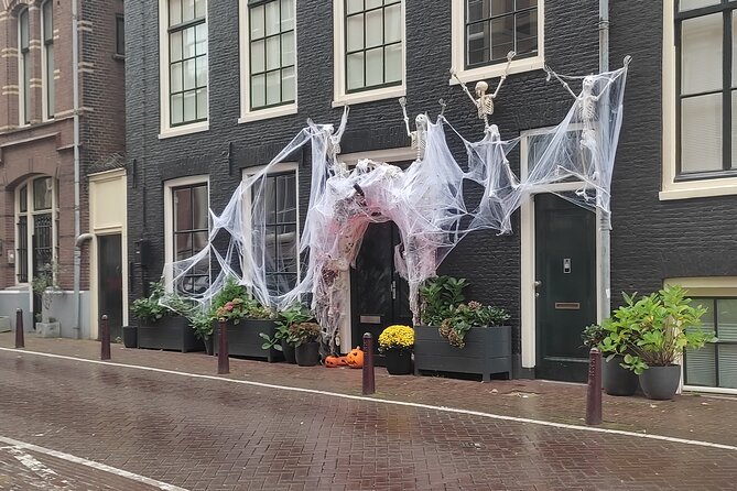 Walking Tour of Haunted Amsterdam - Meet Gerg and the costumed Dam Square introduction