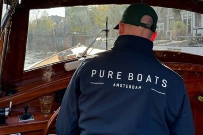 Winter Canal Cruise in Amsterdam - A guided cruise through Amsterdam’s historic canals in winter
