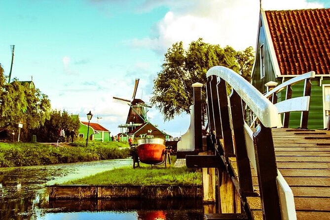 Zaanse Schans Edam Volendam Private Day Tour from Amsterdam - Volendam: promenade wandering, herring moments, and a family smokehouse dinner