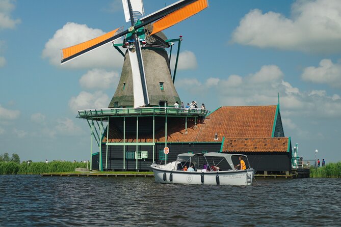 Zaanse Schans Windmill Cruise - UNESCO Windmills With Live Guide - How the houses, tea house, and factory fit the windmill story