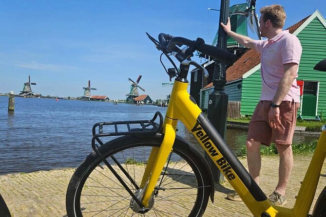 Zaanse Schans Windmills E Bike Day Trip from Amsterdam - Entering the day at Nieuwezijds Kolk, then easing into cycling rhythm